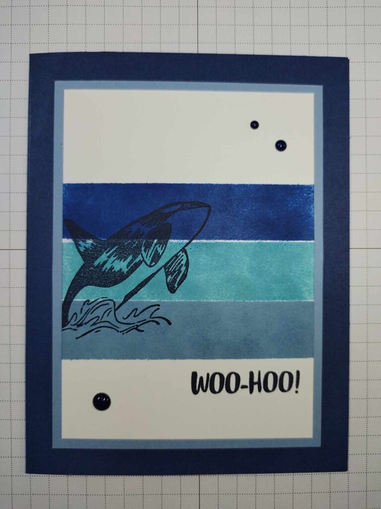Card made with blue inks and a whale stamp set.